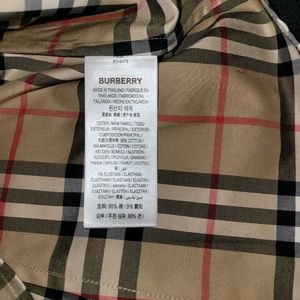Women's Burberry plaid button up. Never wore brand new in excellent condition.
